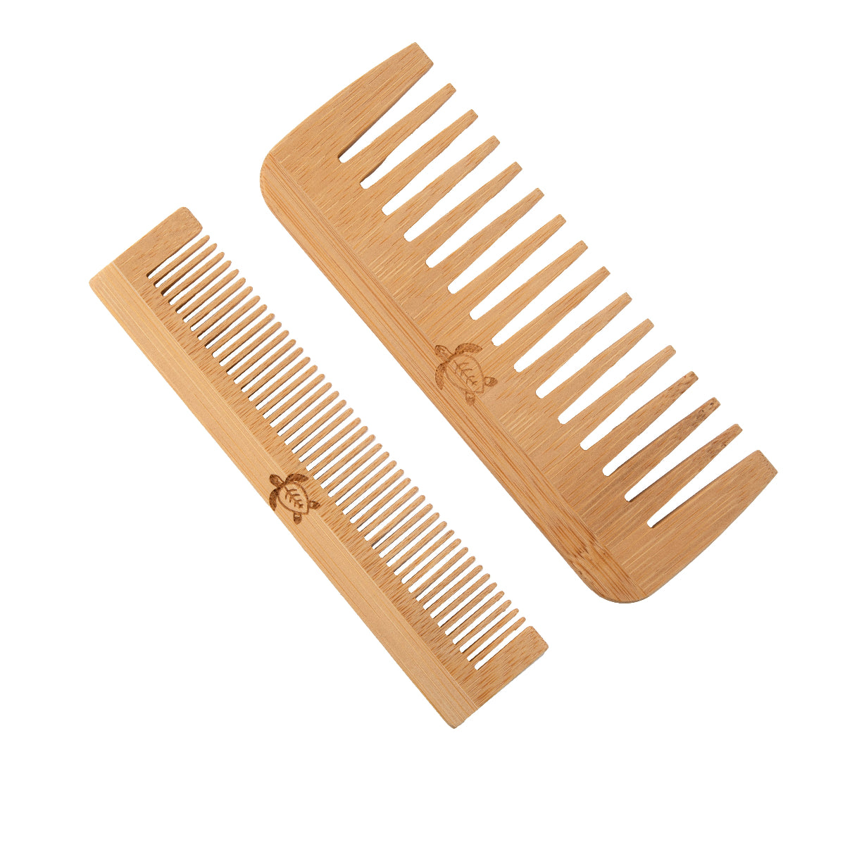 Two wooden combs on a white background